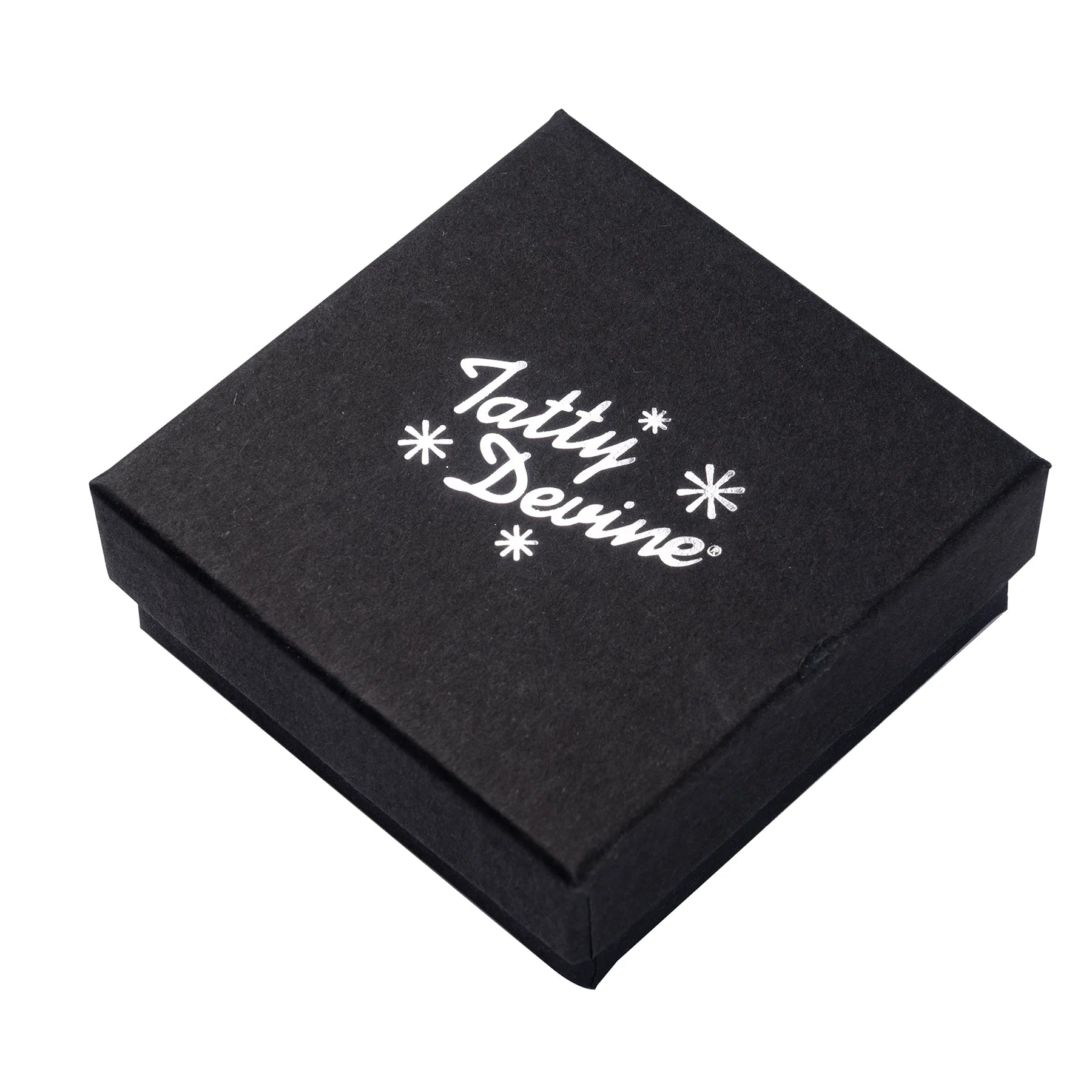 A black jewellery box with Tatty Devine Text