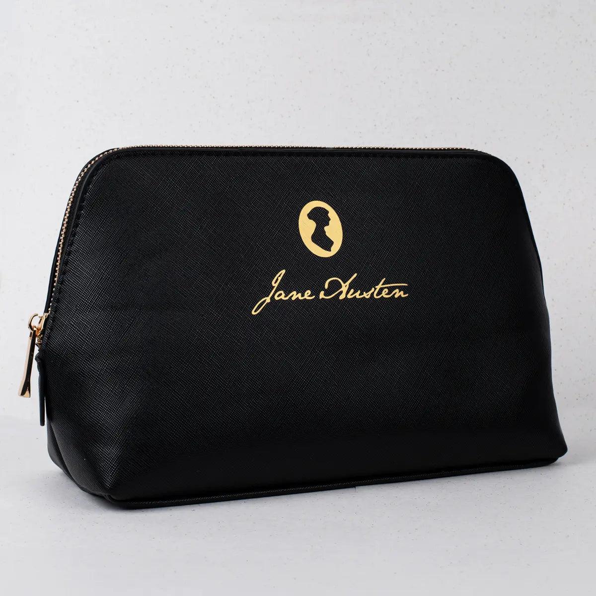 A faux leather cosmetics bag with Jane Austen's iconic signature and silhouette.