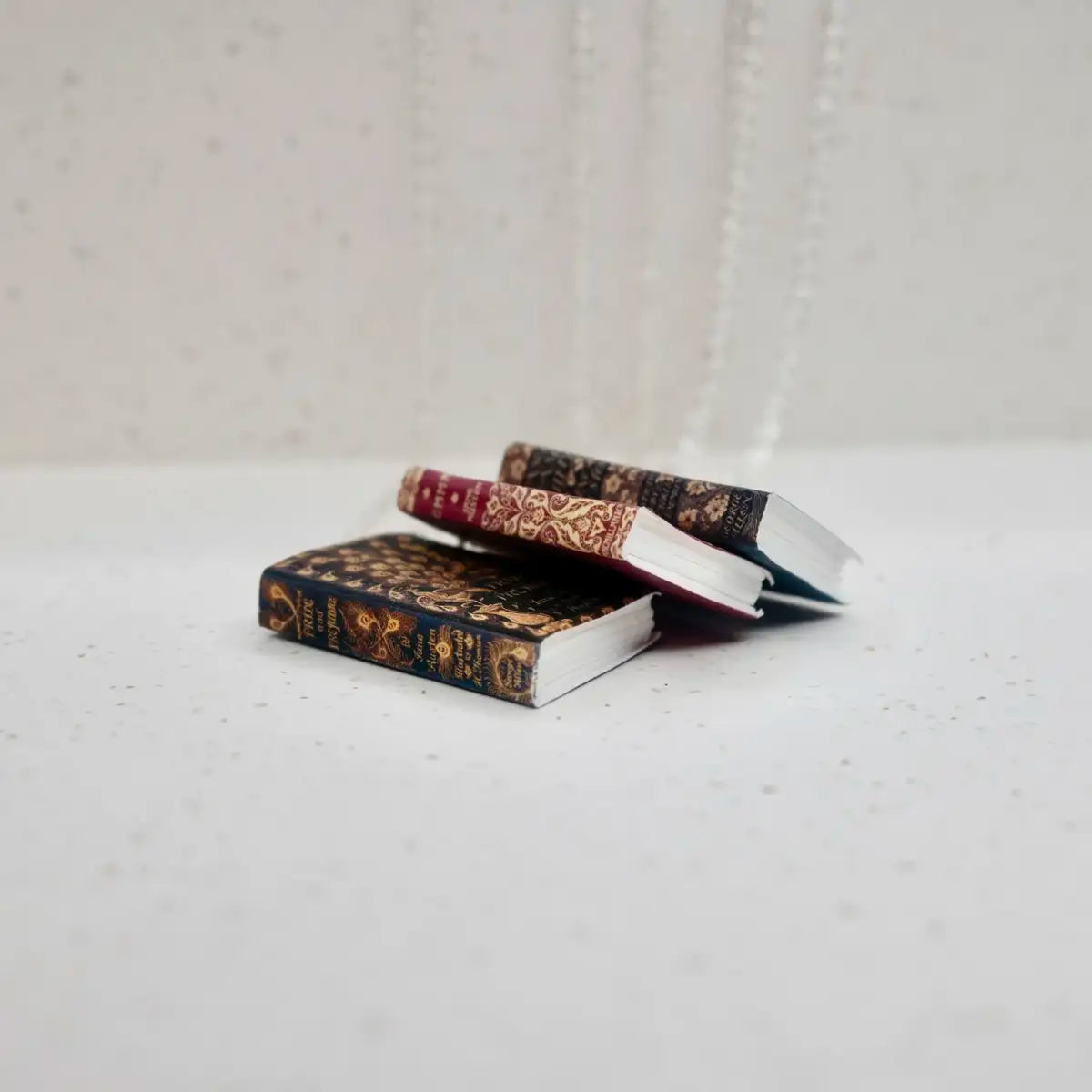 pile of bookpage necklaces
