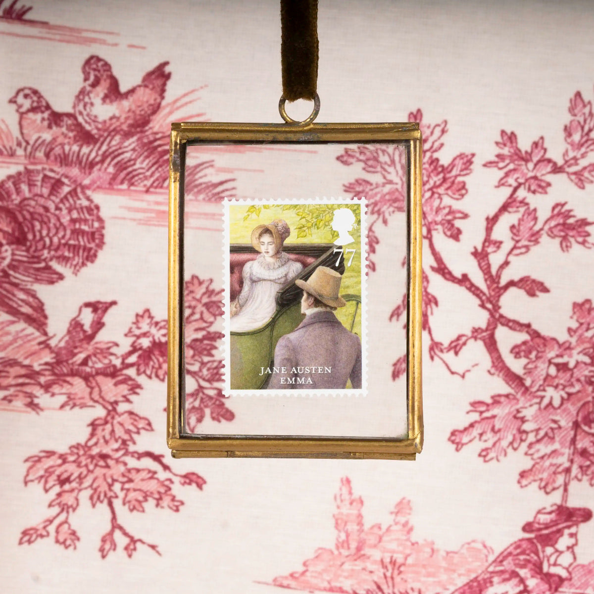 Framed stamp with Jane Austen's 'Emma' on a decorative background