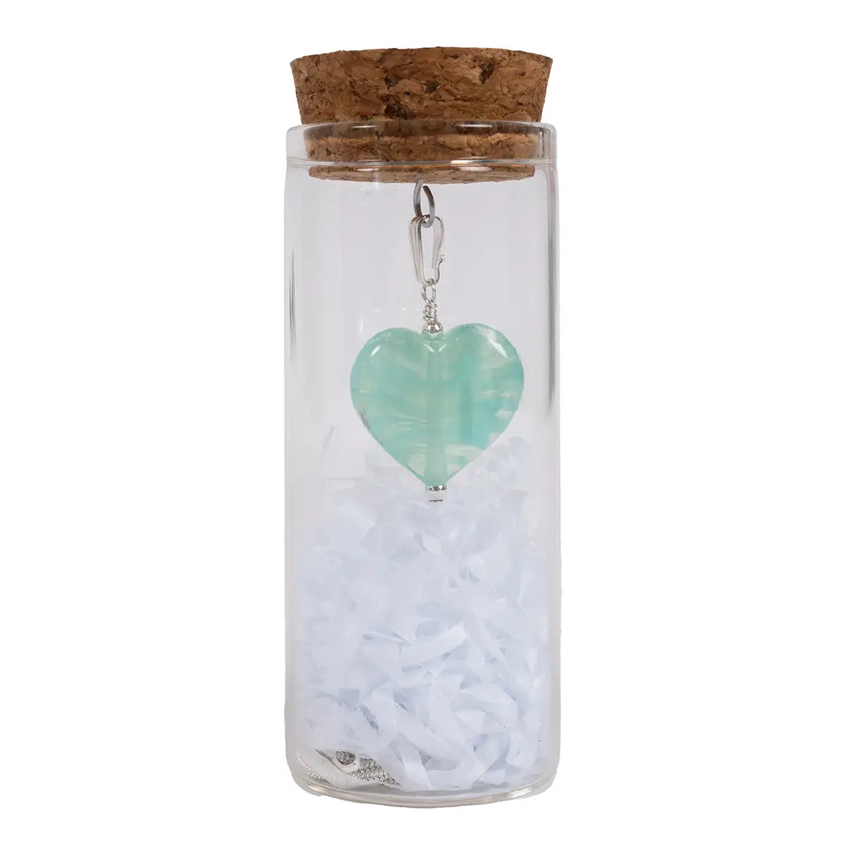 mint glass heart pendant in a glass vial with cork, chain, and shredded tissue paper