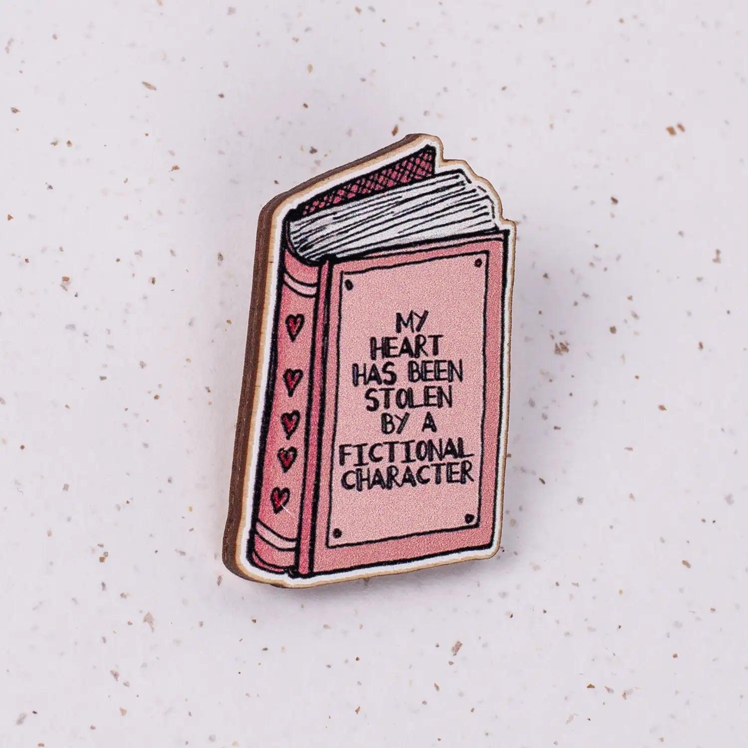 "My heart has been stolen by a fictional character." Pink book design