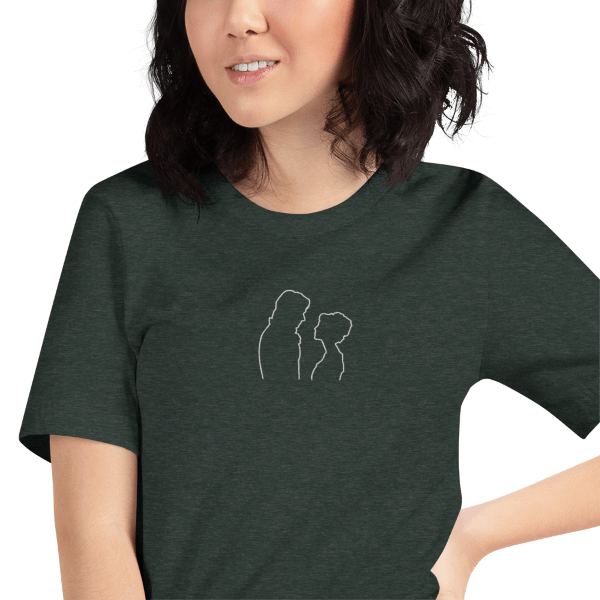 Forest green T-Shirt depicting Lizzie and Darcy's silhouettes as they pause mid-dance to look at eachother.