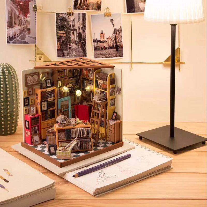 here you can see the library as it would be displayed in a book lovers home. it is shown with warm lighting on a desk. This makes a lovely gift for a bookworm 