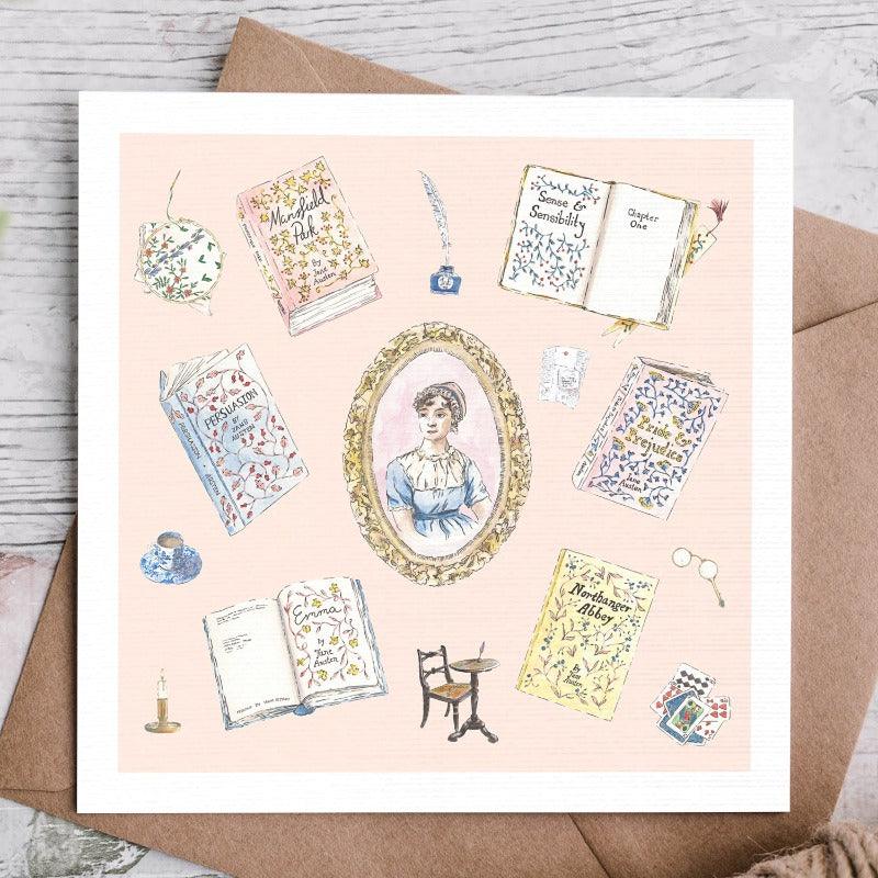 With a faded pink background, a portait of Jane Austen sits in the centre of the card, with each of her books around delicated illustrated around her in a watercolour style.